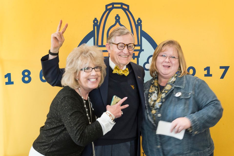 WVU employees pose with President Gee